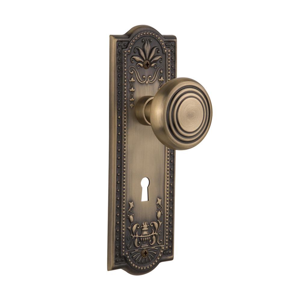 Nostalgic Warehouse MEADEC Complete Mortise Lockset Meadows Plate with Deco Knob in Antique Brass